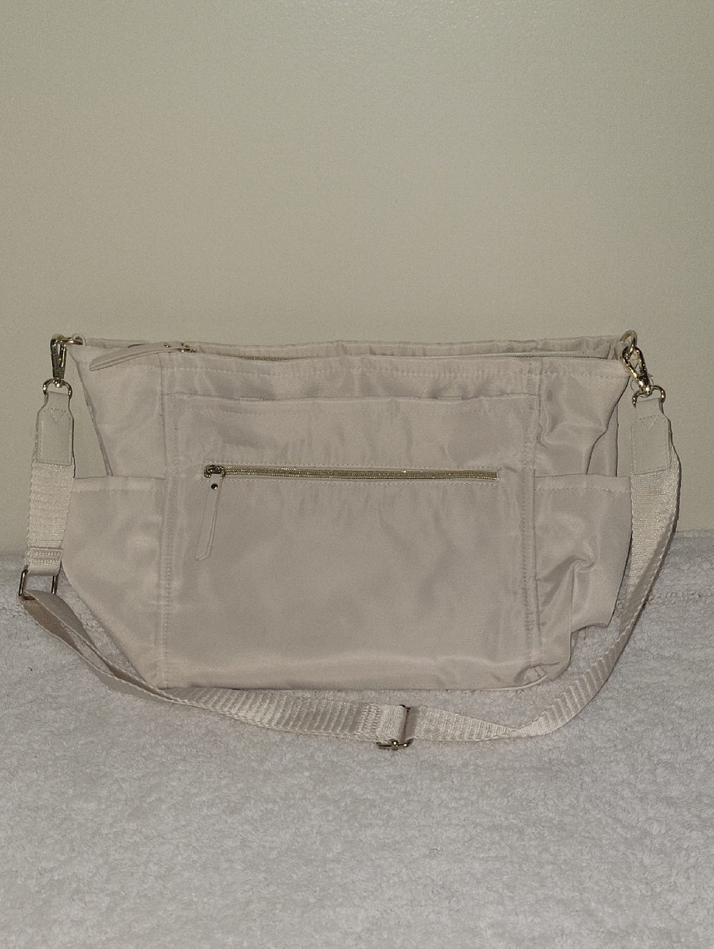 Light Cream Crossbody Travel Bag with Front Zip Pocket NWOT